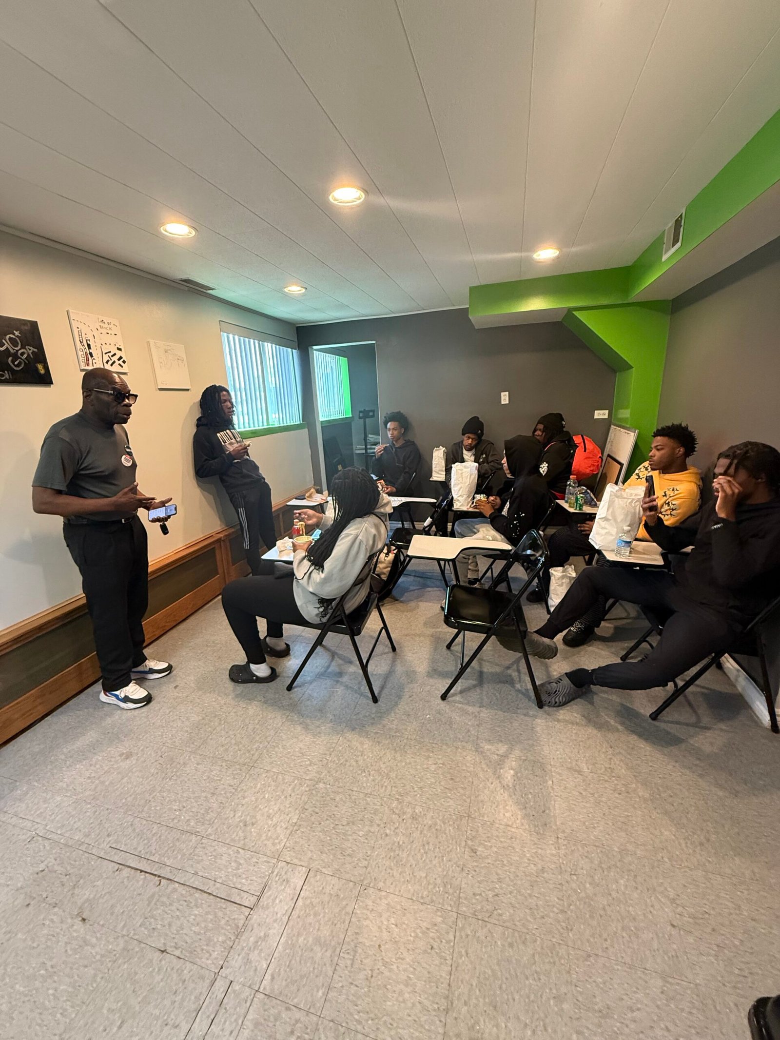 Community members participating in a Touched A Dream Foundation outreach activity